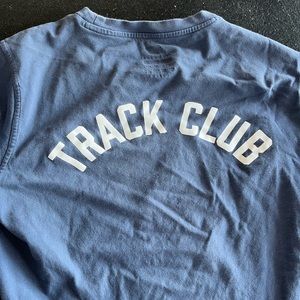 New balance men’s track club blue long sleeve tshirt